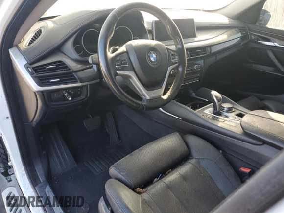 2016 BMW X6 sDrive35i with VIN 5UXKU0C56G0F92990, listed as a Copart auction lot 77191074 with 194,077 mi miles and Salvage Title. Bid and sale history available at carsss.com. Image 8.