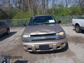 2004 Chevrolet TrailBlazer LT with VIN 1GNDS13S142422830, listed as a IAAI auction lot 42054144 with 218,042 mi miles and . Bid and sale history available at DreamBid. Image 12.