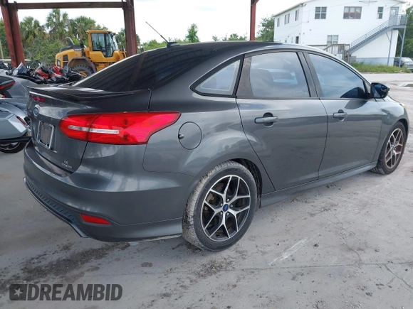 2015 Ford Focus SE with VIN 1FADP3F23FL247162, listed as a IAAI auction lot 42542583 with 95,852 mi miles and . Bid and sale history available at DreamBid. Image 4.