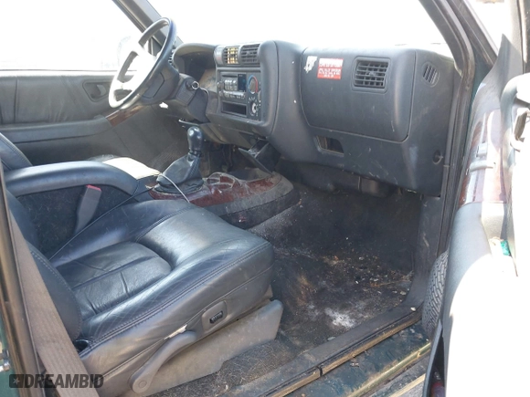 1997 Oldsmobile Bravada with VIN 1GHDT13W8V2713474, listed as a IAAI auction lot 42062680 with 187,046 mi miles. Bid and sale history available at carsss.com. Image 5.