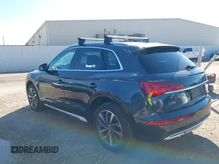2021 Audi Q5 Premium Plus z VIN WA1BAAFY6M2013249, wystawiony jako IAAI lot #38681569 z przebiegiem 68 694 mil mil oraz . Historia ofert i sprzedaży dostępna na DreamBid. Obrazek 3.