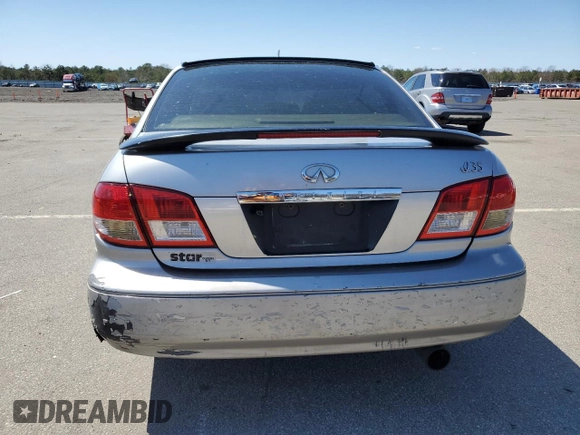 2004 Infiniti I35 z VIN JNKDA31A34T209162, wystawiony jako Copart lot #51990084 z przebiegiem 127 039 mil mil oraz Nie do naprawy • Non repairable. Historia ofert i sprzedaży dostępna na DreamBid. Obrazek 6.