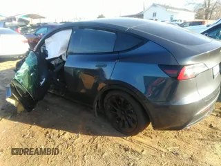 2022 Tesla Model Y Long Range with VIN 7SAYGDEE9NF424928, listed as a IAAI auction lot 41807225 with Not Provided miles and . Bid and sale history available at carsss.com. Image 3.