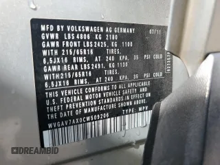 2012 Volkswagen Tiguan SE z VIN WVGAV7AX0CW509206, wystawiony jako Copart lot #52226395 z przebiegiem 108 922 mil mil oraz Szkody całkowita. Historia ofert i sprzedaży dostępna na DreamBid. Obrazek 13.