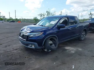 2019 Honda Ridgeline RTL-E with VIN 5FPYK3F76KB010613, listed as a IAAI auction lot 42079810 with 90,492 mi miles and . Bid and sale history available at DreamBid. Image 17.