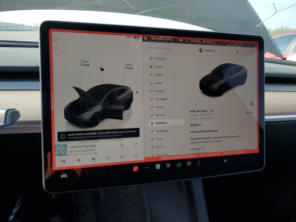 2023 Tesla Model Y Long Range with VIN 7SAYGDEE5PF834645, listed as a Copart auction lot 48596925 with 26,896 mi miles and Salvage Title. Bid and sale history available at DreamBid. Image 9.