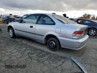 2000 Honda Civic DX z VIN 1HGEJ6226YL055469, wystawiony jako Copart lot #80469814 z przebiegiem Nie podano mil oraz Szkoda całkowita • Salvage title. Historia ofert i sprzedaży dostępna na DreamBid. Obrazek 2.