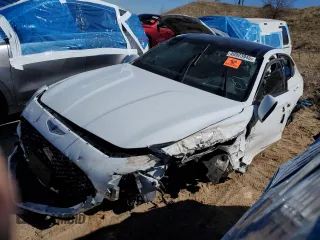 2022 Genesis G70 3.3T with VIN KMTG54TE3NU102585, listed as a Copart auction lot 49923945 with 34,974 mi miles and Salvage title. Bid and sale history available at DreamBid. Image 1.