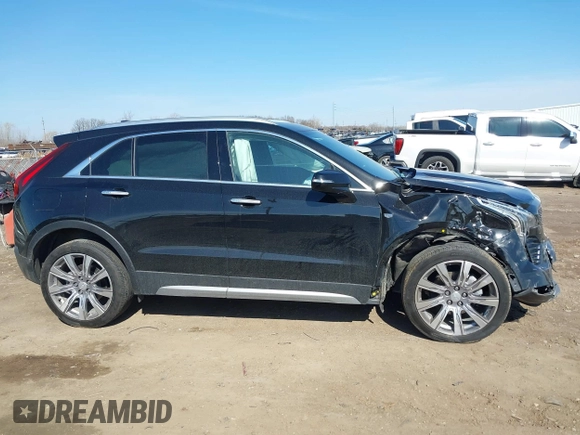 2023 Cadillac XT4 AWD Premium Luxury with VIN 1GYFZDR46PF195391, listed as a IAAI auction lot 41848429 with 31,904 mi miles and . Bid and sale history available at carsss.com. Image 13.