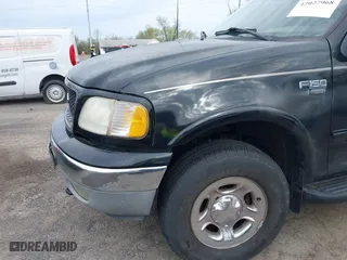 2001 Ford F-150 SuperCrew XLT with VIN 1FTRW08L61KF76055, listed as a IAAI auction lot 42027968 with 301,095 mi miles. Bid and sale history available at carsss.com. Image 6.