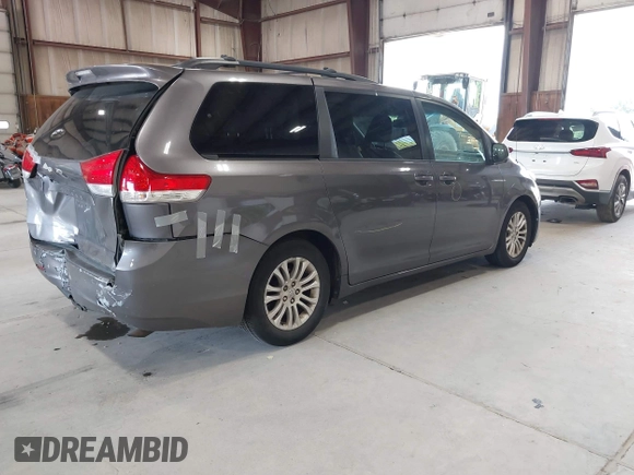 2011 Toyota Sienna XLE AAS z VIN 5TDYK3DC9BS086170, wystawiony jako IAAI lot #42596944 z przebiegiem 156 813 mil mil oraz . Historia ofert i sprzedaży dostępna na DreamBid. Obrazek 4.