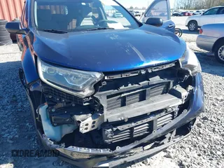 2018 Honda CR-V LX with VIN 2HKRW5H31JH411364, listed as a IAAI auction lot 41825257 with 135,468 mi miles and . Bid and sale history available at DreamBid. Image 6.