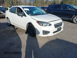 2019 Subaru Impreza with VIN 4S3GKAA60K3601878, listed as a IAAI auction lot 41232262 with 124,201 mi miles. Bid and sale history available at carsss.com. Image 1.