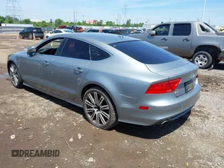 2012 Audi A7 Prestige with VIN WAU2GAFC3CN134940, listed as a IAAI auction lot 42649389 with 163,450 mi miles and . Bid and sale history available at DreamBid. Image 3.