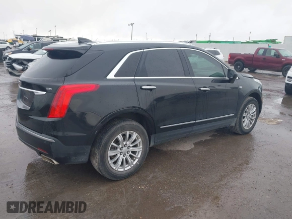 2017 Cadillac XT5 FWD with VIN 1GYKNARS0HZ317508, listed as a IAAI auction lot 40818768 with 132,598 mi miles. Bid and sale history available at carsss.com. Image 4.