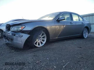 2006 BMW 7 Series 750i with VIN WBAHL83596DT03728, listed as a Copart auction lot 87855795 with 127,513 mi miles and Salvage Title. Bid and sale history available at carsss.com. Image 1.
