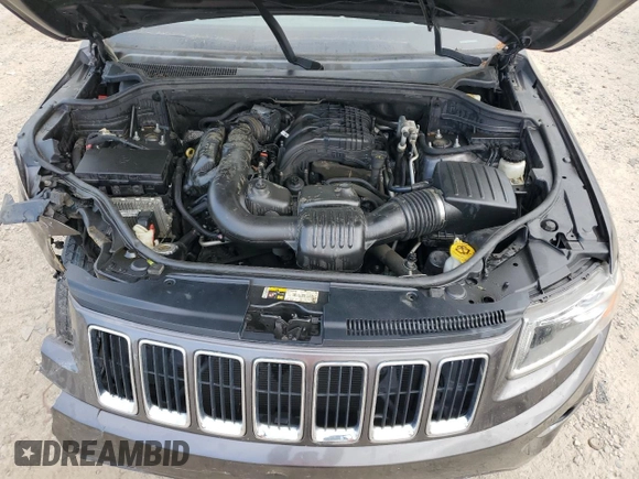 2014 Jeep Grand Cherokee Laredo with VIN 1C4RJEAG0EC388611, listed as a Copart auction lot 53663495 with Not Provided miles and Salvage Title. Bid and sale history available at DreamBid. Image 12.