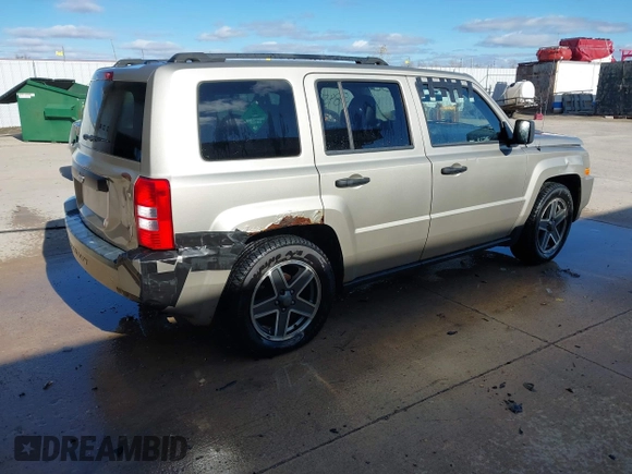 2009 Jeep Patriot Sport with VIN 1J4FT28B59D195435, listed as a IAAI auction lot 40758450 with 130,728 mi miles. Bid and sale history available at carsss.com. Image 4.