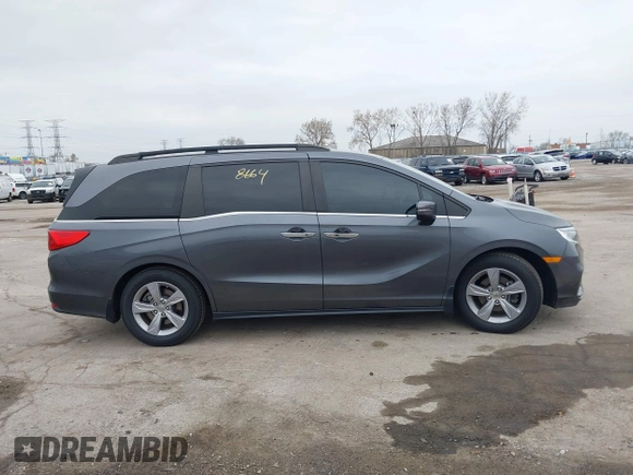 2018 Honda Odyssey EX-L with VIN 5FNRL6H72JB076597, listed as a IAAI auction lot 41838664 with 154,647 mi miles and . Bid and sale history available at DreamBid. Image 13.