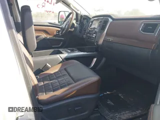 2016 Nissan Titan Platinum Reserve z VIN 1N6BA1F22GN509568, wystawiony jako IAAI lot #41766629 z przebiegiem 94 991 mil mil oraz . Historia ofert i sprzedaży dostępna na DreamBid. Obrazek 5.