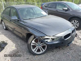 2015 BMW 3 Series 328i with VIN WBA3A5G55FNS90446, listed as a IAAI auction lot 41828658 with 124,867 mi miles. Bid and sale history available at carsss.com. Image 1.