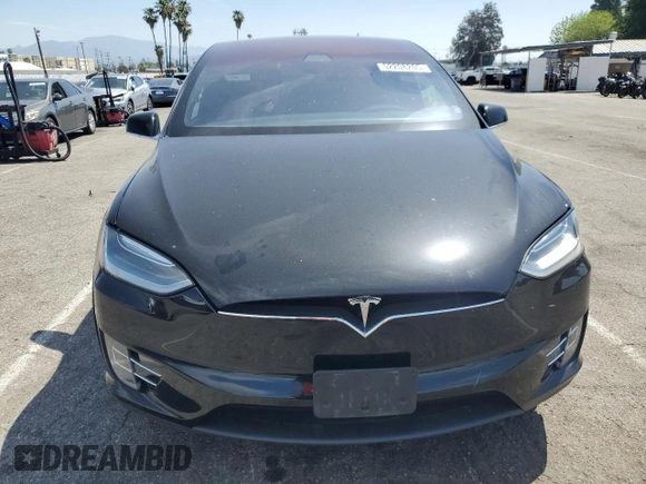 2017 Tesla Model X 90D with VIN 5YJXCBE20HF051099, listed as a Copart auction lot 52208205 with 118,828 mi miles and Salvage Title. Bid and sale history available at DreamBid. Image 5.