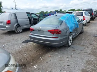 2017 Volkswagen Passat SE with VIN 1VWGT7A32HC061803, listed as a IAAI auction lot 42546429 with 68,093 mi miles and . Bid and sale history available at DreamBid. Image 4.