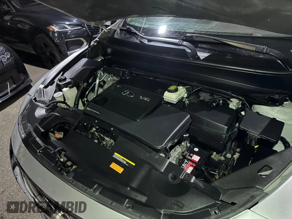 2014 Infiniti QX60 with VIN 5N1AL0MM0EC535839, listed as a Copart auction lot 51951585 with 121,619 mi miles and Salvage title. Bid and sale history available at DreamBid. Image 7.