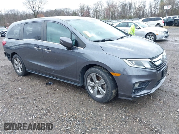 2018 Honda Odyssey EX-L z VIN 5FNRL6H70JB025227, wystawiony jako IAAI lot #41940992 z przebiegiem 95 797 mil mil oraz . Historia ofert i sprzedaży dostępna na DreamBid. Obrazek 1.
