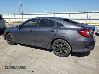 2019 Honda Civic Sport with VIN 2HGFC2F80KH565567, listed as a Copart auction lot 52384625 with 89,947 mi miles and Salvage title. Bid and sale history available at DreamBid. Image 2.