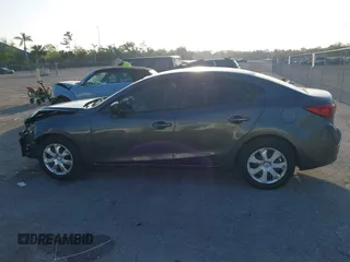 2016 Mazda 3 i Sport with VIN 3MZBM1T70GM305353, listed as a IAAI auction lot 42101846 with 103,791 mi miles and . Bid and sale history available at DreamBid. Image 14.