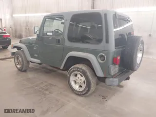 1999 Jeep Wrangler Sport with VIN 1J4FY19S0XP496555, listed as a IAAI auction lot 42110414 with 125,500 mi miles. Bid and sale history available at carsss.com. Image 3.