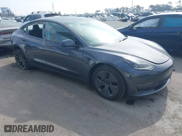 2023 Tesla Model 3 z VIN 5YJ3E1EA0PF577869, wystawiony jako IAAI lot #41468956 z przebiegiem 38 760 mil mil oraz . Historia ofert i sprzedaży dostępna na DreamBid. Obrazek 1.
