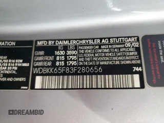2003 Mercedes-Benz SLK 320 with VIN WDBKK65F83F280656, listed as a Copart auction lot 79158954 with 99,413 mi miles and Salvage title. Bid and sale history available at DreamBid. Image 12.