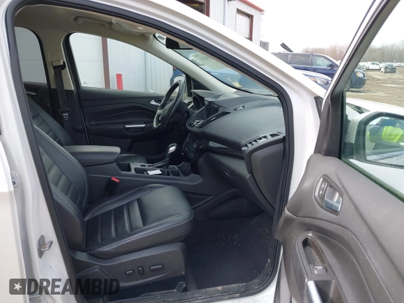 2019 Ford Escape Titanium with VIN 1FMCU9J97KUB85528, listed as a IAAI auction lot 41708344 with 88,841 mi miles. Bid and sale history available at carsss.com. Image 5.