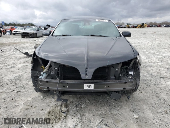 2015 Lincoln MKS z VIN 1LNHL9DK4FG603765, wystawiony jako Copart lot #47533935 z przebiegiem 75 284 mil mil oraz Szkoda całkowita • Salvage title. Historia ofert i sprzedaży dostępna na DreamBid. Obrazek 5.