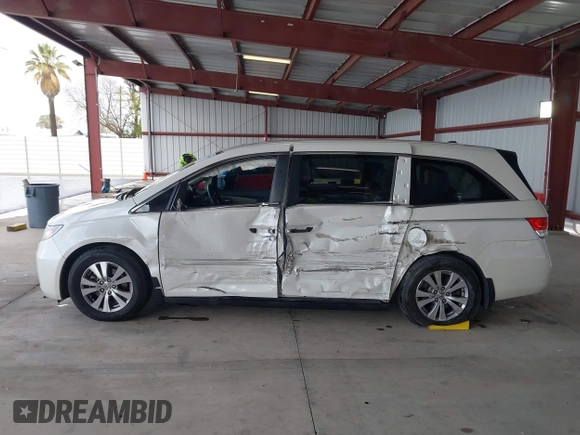 2015 Honda Odyssey EX-L with VIN 5FNRL5H64FB084175, listed as a IAAI auction lot 41943540 with 67,902 mi miles and . Bid and sale history available at carsss.com. Image 14.