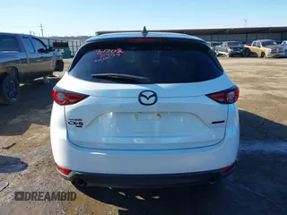 2021 Mazda CX-5 Grand Touring with VIN JM3KFBDM3M0417738, listed as a IAAI auction lot 41308123 with 90,134 mi miles. Bid and sale history available at carsss.com. Image 17.