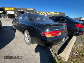 1995 Lexus SC 400 z VIN JT8UZ30CXS0041496, wystawiony jako Copart lot #80837114 z przebiegiem 62 010 mil mil oraz Tytuł czysty. Historia ofert i sprzedaży dostępna na DreamBid. Obrazek 3.