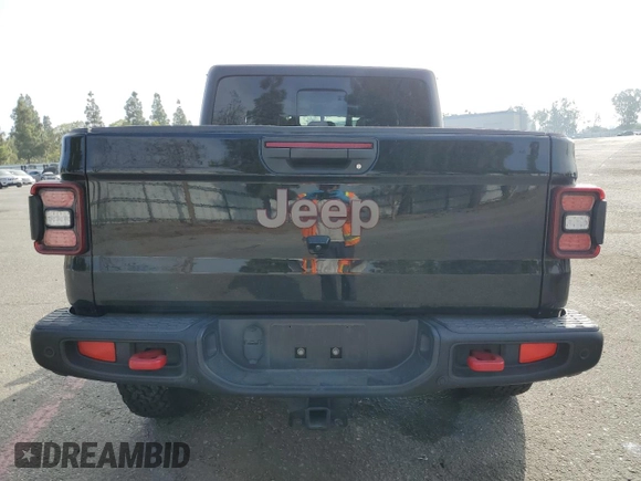 2020 Jeep Gladiator Rubicon z VIN 1C6JJTBG7LL197837, wystawiony jako Copart lot #58169095 z przebiegiem 59 578 mil mil oraz Szkoda całkowita • Salvage title. Historia ofert i sprzedaży dostępna na DreamBid. Obrazek 6.