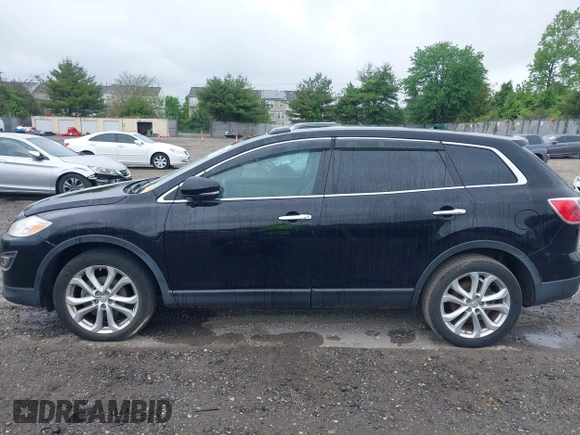 2012 Mazda CX-9 Grand Touring z VIN JM3TB3DV1C0360212, wystawiony jako IAAI lot #42232584 z przebiegiem 99 582 mil mil oraz . Historia ofert i sprzedaży dostępna na DreamBid. Obrazek 14.