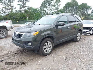 2012 Kia Sorento LX with VIN 5XYKT3A65CG254788, listed as a IAAI auction lot 42213355 with 137,772 mi miles and . Bid and sale history available at carsss.com. Image 2.