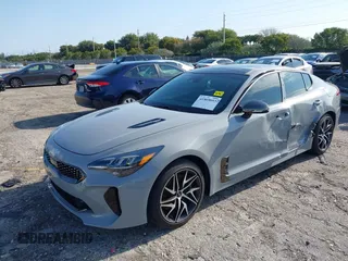 2023 Kia Stinger GT-Line with VIN KNAE35LD3P6136247, listed as a IAAI auction lot 41969093 with 27,905 mi miles. Bid and sale history available at carsss.com. Image 2.