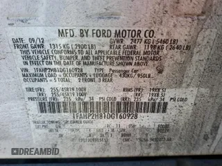 2013 Ford Taurus SEL with VIN 1FAHP2H81DG160928, listed as a Copart auction lot 43796985 with Not Provided miles and Salvage Title. Bid and sale history available at DreamBid. Image 12.