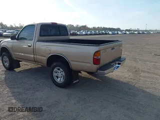 1999 Toyota Tacoma with VIN 4TAPM62NXXZ439318, listed as a IAAI auction lot 41721442 with 299,876 mi miles and . Bid and sale history available at DreamBid. Image 3.