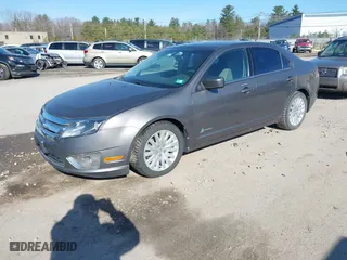 2011 Ford Fusion Hybrid with VIN 3FADP0L36BR114063, listed as a IAAI auction lot 42013961 with 141,255 mi miles. Bid and sale history available at carsss.com. Image 2.