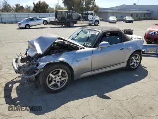 2003 Honda S2000 with VIN JHMAP11483T006461, listed as a Copart auction lot 52099995 with 187,376 mi miles and Salvage Title. Bid and sale history available at DreamBid. Image 1.