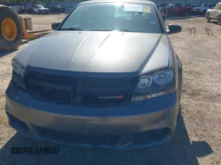 2014 Dodge Avenger SE z VIN 1C3CDZAB1EN189407, wystawiony jako IAAI lot #41972290 z przebiegiem 194 045 mil mil oraz . Historia ofert i sprzedaży dostępna na DreamBid. Obrazek 6.
