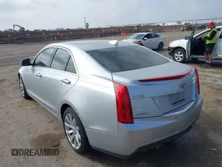 2018 Cadillac ATS RWD z VIN 1G6AA5RX5J0178702, wystawiony jako IAAI lot #41522724 z przebiegiem 79 502 mil mil oraz . Historia ofert i sprzedaży dostępna na DreamBid. Obrazek 3.
