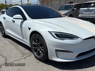 2021 Tesla Model S Plaid with VIN 5YJSA1E64MF447124, listed as a Copart auction lot 55833265 with 61,623 mi miles and Clean title. Bid and sale history available at DreamBid. Image 1.